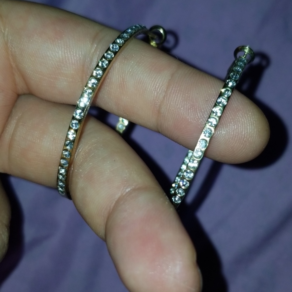 Gold tone and cubic Zirconia hoops.